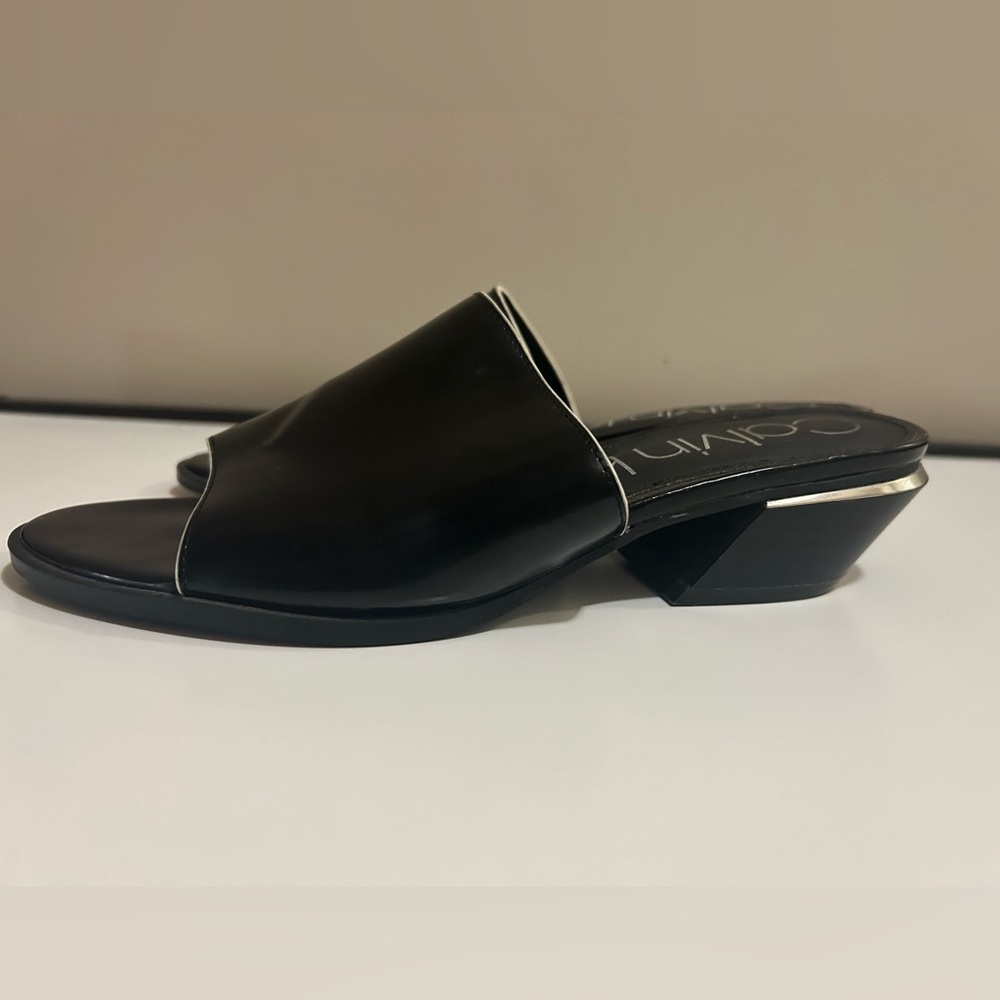 Calvin Klein small wedge slides.